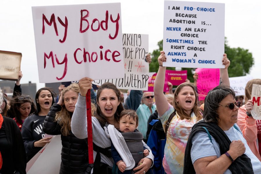 Protesters against abortion bans in St. Paul , MN in 2019