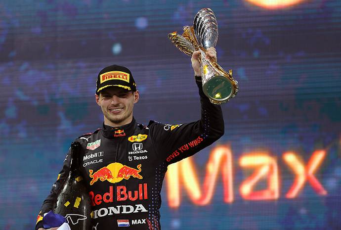 Triumphant+Verstappen+celebrates+after+eking+out+a+win+against+Lewis+Hamilton+in+the+Abu+Dhabi+Grand+Prix