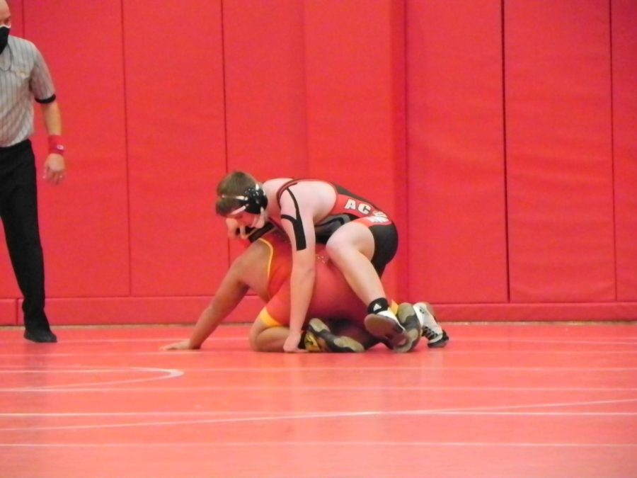 Brody Whitaker 24 works to flip his opponent.