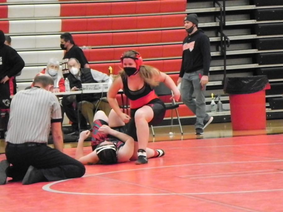 Aubin getting up after  finishing off her opponent.