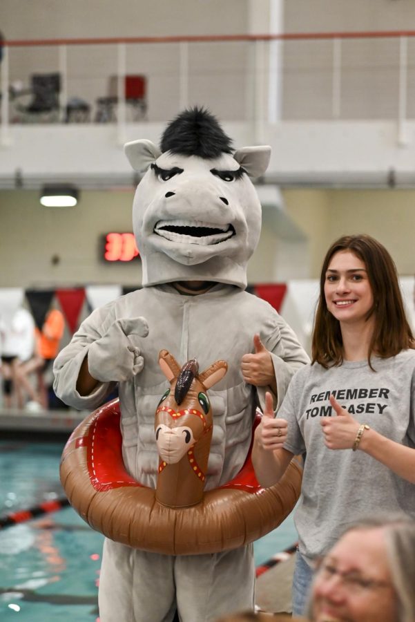 Alicia Harris and our beloved mascot featuring Coach Liz enjoyng the meet.