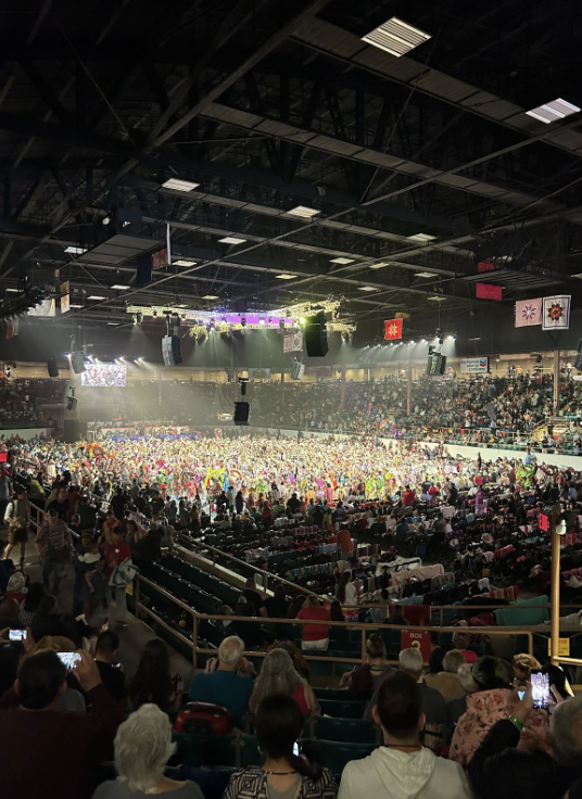 Tingley Coliseum floor is packed with colorful dancers.