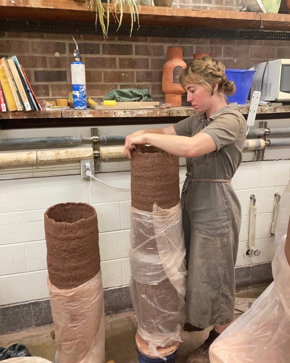Ms. Wright at work in the clay studio.