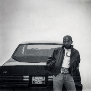 GNX's album cover, picturing Kendrick Lamar leaning on a 1987 Buick Grand National Experimental (GNX), which he had announced buying earlier in 2024.