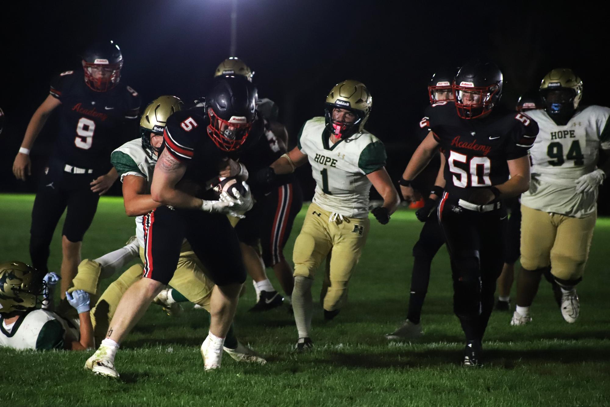 Chargers and Cheer Team Draw Crowds Under the Lights
